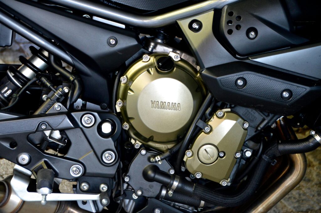 Detailed view of a Yamaha motorcycle engine showcasing modern automotive design.